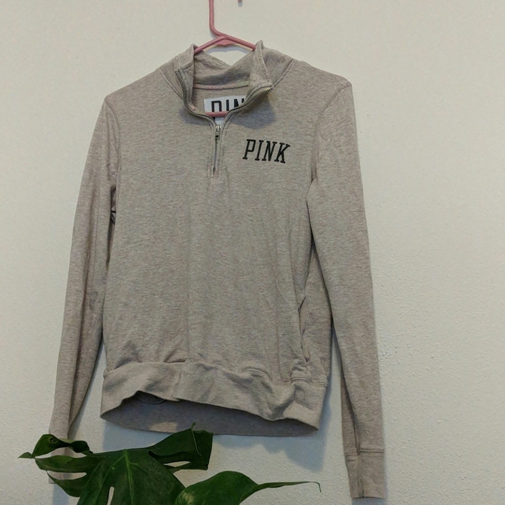Pink quarter-zip sweatshirt